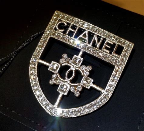 authentic chanel brooch vs fake|does chanel have fraud site.